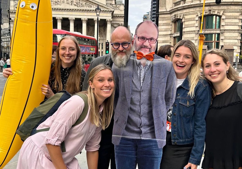 Cardboard Adam, real Adam and Ben Nana with the team